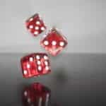 Red dice falling.